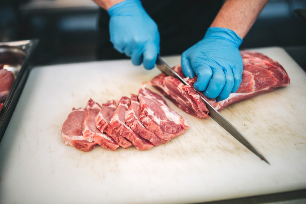 Cutting-Meat-with-Butcher-Knive